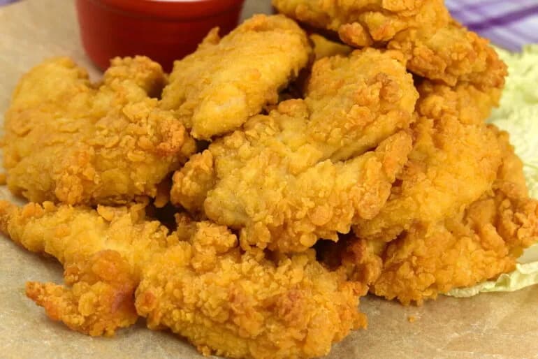 Pyszne polędwiczki drobiowe przepis na soczyste kąski w panierce